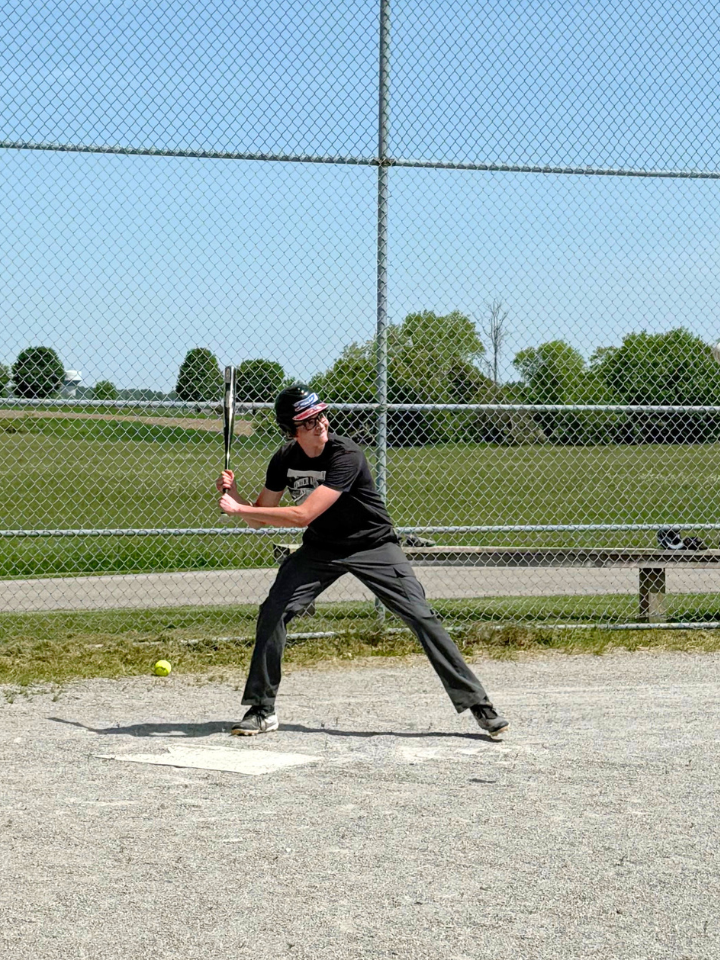 Summer student playing baseball.